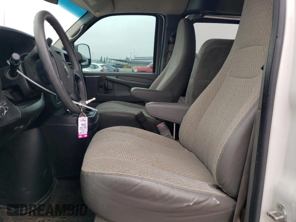 2012 Chevrolet Express Passenger 1LT with VIN 1GAZGYFG8C1174282, listed as a Copart auction lot 86012024 with 170,680 mi miles and Salvage title. Bid and sale history available at DreamBid. Image 7.