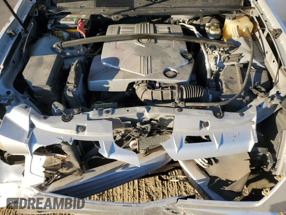 2009 Cadillac SRX RWD z VIN 1GYEE637890117173, wystawiony jako Copart lot #42098225 z przebiegiem 124 902 mil mil oraz Szkoda całkowita • Salvage title. Historia ofert i sprzedaży dostępna na DreamBid. Obrazek 13.