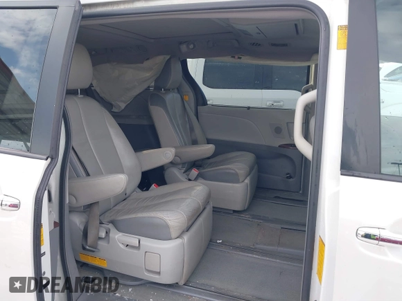 2013 Toyota Sienna XLE AAS with VIN 5TDYK3DC9DS380445, listed as a IAAI auction lot 41308312 with 174,325 mi miles and . Bid and sale history available at DreamBid. Image 8.