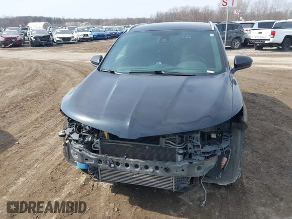 2015 Lincoln MKC with VIN 5LMTJ2AH0FUJ04461, listed as a IAAI auction lot 41804169 with 97,187 mi miles. Bid and sale history available at carsss.com. Image 6.