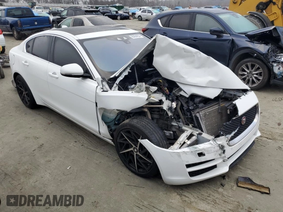 2019 Jaguar XE 25t Premium with VIN SAJAD4FX2KCP54489, listed as a Copart auction lot 85994934 with 79,018 mi miles and Salvage Title. Bid and sale history available at carsss.com. Image 4.