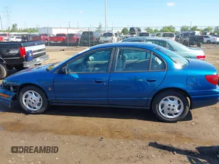 2002 Saturn SL with VIN 1G8ZK52742Z289921, listed as a IAAI auction lot 42340896 with 165,328 mi miles and . Bid and sale history available at DreamBid. Image 14.