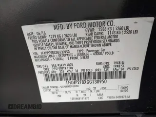 2016 Ford Taurus Limited with VIN 1FAHP2F8XGG130950, listed as a IAAI auction lot 41833038 with 128,536 mi miles and . Bid and sale history available at DreamBid. Image 9.