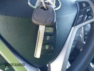 2012 Hyundai Veloster w/Black Int с VIN KMHTC6AD8CU046029, выставлен на аукционе IAAI как лот 41664151 с пробегом 163 523 миль миль и . История ставок и продаж доступна на DreamBid. Изображение 11.