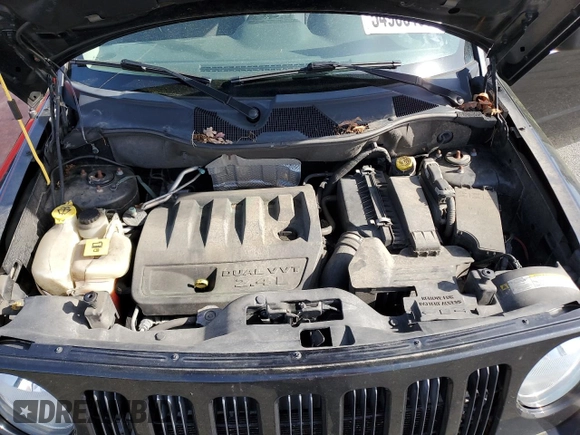 2010 Jeep Patriot Sport with VIN 1J4NF2GB0AD571175, listed as a Copart auction lot 54985195 with 112,365 mi miles and Clean Title. Bid and sale history available at carsss.com. Image 12.