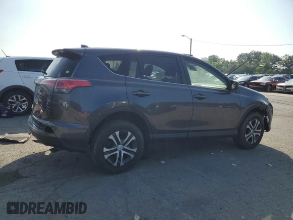 2018 Toyota RAV4 LE with VIN JTMBFREV5JJ736492, listed as a Copart auction lot 63794335 with 97,374 mi miles and Clean title. Bid and sale history available at DreamBid. Image 3.