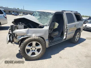 2004 Chevrolet Tahoe LS z VIN 1GNEC13V64J327536, wystawiony jako Copart lot #52971375 z przebiegiem Nie podano mil oraz Szkoda całkowita • Salvage title. Historia ofert i sprzedaży dostępna na DreamBid. Obrazek 1.