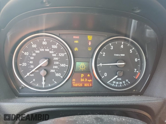 2009 BMW 3 Series 328i xDrive with VIN WBAPK73559A456475, listed as a Copart auction lot 62363865 with 169,125 mi miles and Salvage title. Bid and sale history available at DreamBid. Image 9.