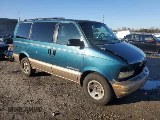 1999 GMC Safari with VIN 1GKEL19W0XB509860, listed as a Copart auction lot 84671294 with 141,872 mi miles and Salvage Title. Bid and sale history available at carsss.com. Image 4.