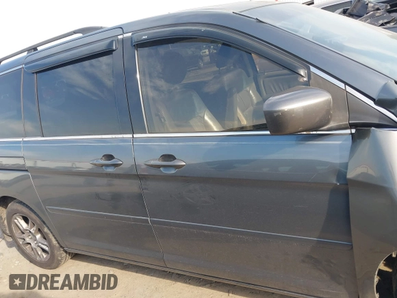 2010 Honda Odyssey EX-L with VIN 5FNRL3H7XAB099821, listed as a IAAI auction lot 41680729 with 217,458 mi miles and . Bid and sale history available at DreamBid. Image 13.