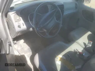 1998 Ford Ranger XL с VIN 1FTYR11U2WTA04817, выставлен на аукционе Copart как лот 64285165 с пробегом 189 999 миль миль и Списание • Salvage title. История ставок и продаж доступна на DreamBid. Изображение 8.