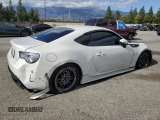 2015 Subaru BRZ Series.Blue with VIN JF1ZCAC12F9600988, listed as a Copart auction lot 45686235 with 142,887 mi miles and Salvage Title. Bid and sale history available at carsss.com. Image 3.