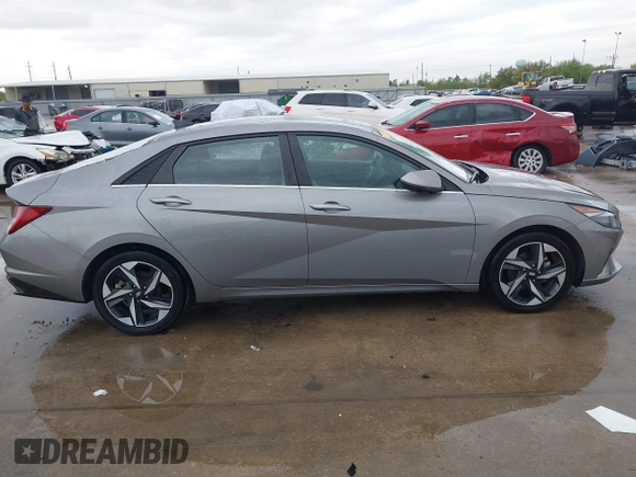 2021 Hyundai Elantra SEL z VIN KMHLN4AG7MU146908, wystawiony jako IAAI lot #41896524 z przebiegiem 37 444 mil mil oraz . Historia ofert i sprzedaży dostępna na DreamBid. Obrazek 13.