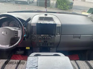 2005 Nissan Titan LE with VIN 1N6AA07B35N537476, listed as a Copart auction lot 61576665 with 189,000 mi miles and Clean title. Bid and sale history available at DreamBid. Image 9.