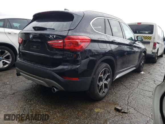 2018 BMW X1 sDrive28i with VIN WBXHU7C37J5L05153, listed as a Copart auction lot 36528533 with 40,704 mi miles. Bid and sale history available at carsss.com. Image 3.