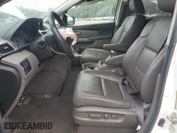 2013 Honda Odyssey EX-L with VIN 5FNRL5H62DB048370, listed as a Copart auction lot 63013465 with 129,552 mi miles and Salvage title. Bid and sale history available at DreamBid. Image 7.