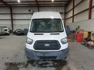 2017 Ford Transit z VIN 1FTYR2XM2HKA66479, wystawiony jako IAAI lot #41371992 z przebiegiem 122 534 mil mil oraz . Historia ofert i sprzedaży dostępna na DreamBid. Obrazek 12.