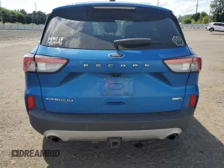 2020 Ford Escape Titanium z VIN 1FMCU9J90LUB15564, wystawiony jako Copart lot #59673625 z przebiegiem 84 474 mil mil oraz Czysty tytuł • Clean title. Historia ofert i sprzedaży dostępna na DreamBid. Obrazek 6.