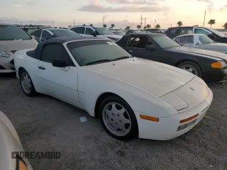 1990 Porsche 944 with VIN WP0CB2949LN481351, listed as a Copart auction lot 75335194 with 70,964 mi miles and Salvage title. Bid and sale history available at DreamBid. Image 4.