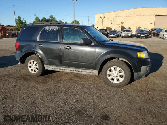 2011 Mazda Tribute Touring with VIN 4F2CY0C70BKM02624, listed as a Copart auction lot 75472464 with 172,077 mi miles and Salvage Title. Bid and sale history available at carsss.com. Image 4.