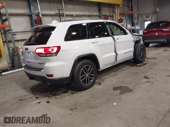 2018 Jeep Grand Cherokee Trailhawk with VIN 1C4RJFLG8JC267810, listed as a IAAI auction lot 41221229 with 108,228 mi miles and . Bid and sale history available at DreamBid. Image 4.