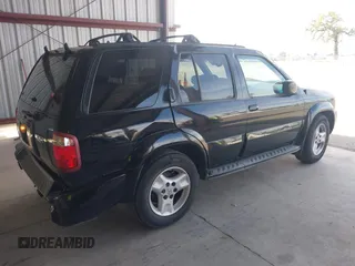 2002 Infiniti QX4 with VIN JNRDR09XX2W212458, listed as a IAAI auction lot 41770184 with 208,441 mi miles and . Bid and sale history available at DreamBid. Image 4.
