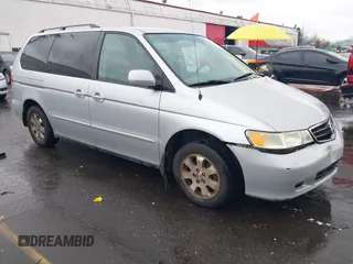 2004 Honda Odyssey EX-L with VIN 5FNRL18934B016420, listed as a IAAI auction lot 41473237 with 188,659 mi miles and . Bid and sale history available at DreamBid. Image 1.