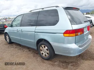 2004 Honda Odyssey EX-L with VIN 5FNRL18064B060817, listed as a IAAI auction lot 42032796 with 200,999 mi miles and . Bid and sale history available at DreamBid. Image 3.