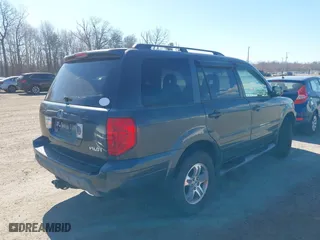 2005 Honda Pilot EX-L with NAVI with VIN 2HKYF18705H559938, listed as a IAAI auction lot 41814487 with 188,665 mi miles. Bid and sale history available at carsss.com. Image 4.