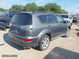 2011 Mitsubishi Outlander SE with VIN JA4AS3AWXBU022418, listed as a IAAI auction lot 40025021 with 188,695 mi miles. Bid and sale history available at carsss.com. Image 4.