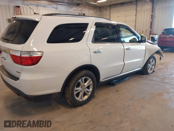 2013 Dodge Durango Crew with VIN 1C4RDHDG5DC553913, listed as a IAAI auction lot 42227189 with 209,703 mi miles and . Bid and sale history available at DreamBid. Image 4.