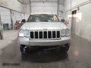 2008 Jeep Grand Cherokee Laredo with VIN 1J8GR48K68C213992, listed as a IAAI auction lot 41344172 with 222,486 mi miles. Bid and sale history available at carsss.com. Image 12.
