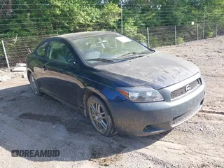 2007 Scion tC Spec z VIN JTKDE177270145779, wystawiony jako IAAI lot #42272045 z przebiegiem 103 111 mil mil oraz . Historia ofert i sprzedaży dostępna na DreamBid. Obrazek 1.
