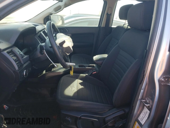 2023 Ford Ranger XL with VIN 1FTER4EH2PLE26234, listed as a Copart auction lot 86579934 with 59,389 mi miles and Salvage title. Bid and sale history available at DreamBid. Image 7.