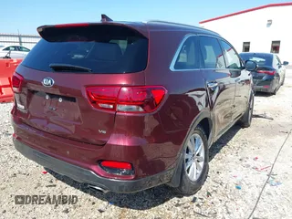 2019 Kia Sorento LX z VIN 5XYPG4A53KG442330, wystawiony jako IAAI lot #41979033 z przebiegiem 95 335 mil mil oraz . Historia ofert i sprzedaży dostępna na DreamBid. Obrazek 4.