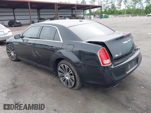 2013 Chrysler 300 with VIN 2C3CCABT2DH735764, listed as a IAAI auction lot 41977616 with 164,517 mi miles. Bid and sale history available at carsss.com. Image 3.