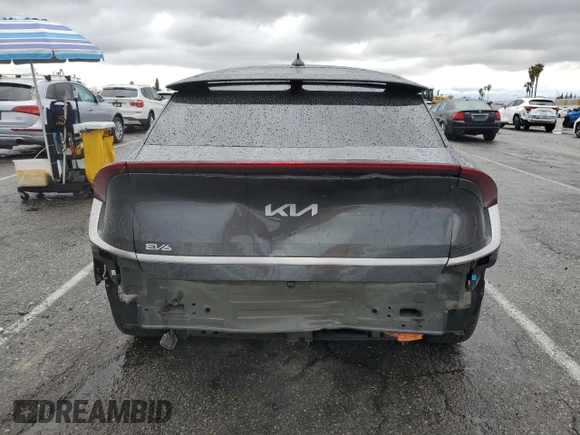 2022 Kia EV6 Wind with VIN KNDC3DLC9N5032778, listed as a Copart auction lot 48432705 with 73,390 mi miles and Salvage Title. Bid and sale history available at carsss.com. Image 6.