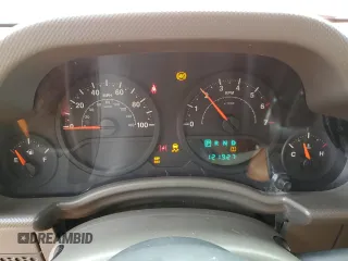 2009 Jeep Wrangler X z VIN 1J4FA24139L740959, wystawiony jako Copart lot #56509075 z przebiegiem 121 927 mil mil oraz Szkoda całkowita • Salvage title. Historia ofert i sprzedaży dostępna na DreamBid. Obrazek 9.