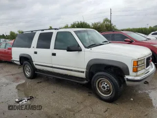 1997 GMC Suburban z VIN 1GKGK26JXVJ715765, wystawiony jako Copart lot #73188284 z przebiegiem 301 101 mil mil oraz Szkoda całkowita • Salvage title. Historia ofert i sprzedaży dostępna na DreamBid. Obrazek 4.