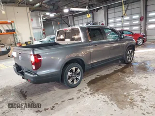 2019 Honda Ridgeline RTL with VIN 5FPYK2F54KB005791, listed as a IAAI auction lot 41285980 with 49,729 mi miles and . Bid and sale history available at DreamBid. Image 4.