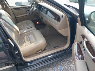 2001 Lincoln Town Car Signature with VIN 1LNHM82W11Y613959, listed as a IAAI auction lot 42432229 with 144,660 mi miles and . Bid and sale history available at DreamBid. Image 5.