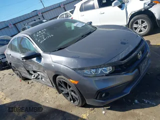 2020 Honda Civic Sedan Sport with VIN 19XFC2F81LE011756, listed as a IAAI auction lot 41667156 with 79,527 mi miles. Bid and sale history available at carsss.com. Image 1.