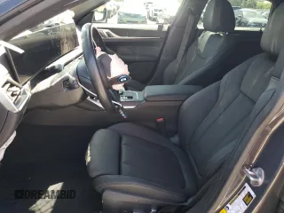 2023 BMW i4 eDrive40 with VIN WBY73AW0XPFR26365, listed as a Copart auction lot 56900944 with 15,017 mi miles and Salvage Title. Bid and sale history available at carsss.com. Image 7.