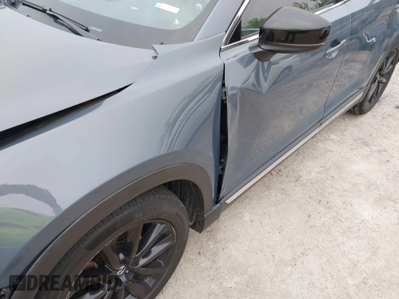 2023 Mazda CX-9 Grand Touring with VIN JM3TCBDY2P0636226, listed as a IAAI auction lot 42384360 with 161,352 mi miles and . Bid and sale history available at DreamBid. Image 18.