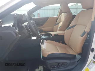 2024 Lexus ES 300h with VIN 58ADA1C10RU043577, listed as a Copart auction lot 55344905 with 9,829 mi miles and Salvage title. Bid and sale history available at DreamBid. Image 7.