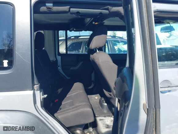 2013 Jeep Wrangler Unlimited Sport with VIN 1C4BJWDGXDL651995, listed as a IAAI auction lot 41578040 with 114,698 mi miles. Bid and sale history available at carsss.com. Image 8.