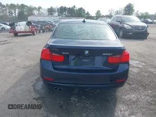 2013 BMW 3 Series 328i xDrive with VIN WBA3B5G53DNS02293, listed as a IAAI auction lot 42012883 with 243,490 mi miles. Bid and sale history available at carsss.com. Image 16.