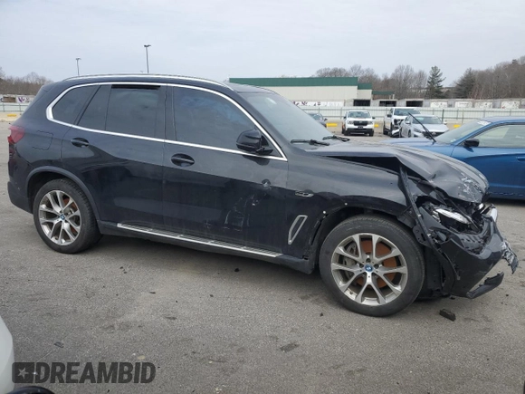 2022 BMW X5 xDrive45e with VIN 5UXTA6C06N9L85476, listed as a Copart auction lot 47096945 with 0 mi miles and Salvage Title. Bid and sale history available at carsss.com. Image 4.