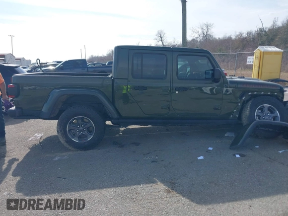 2023 Jeep Gladiator Rubicon with VIN 1C6JJTBGXPL586154, listed as a IAAI auction lot 41370352 with 11,207 mi miles and . Bid and sale history available at DreamBid. Image 13.