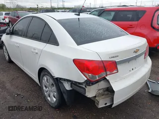 2014 Chevrolet Cruze LS with VIN 1G1PA5SH0E7145168, listed as a IAAI auction lot 41957410 with 151,422 mi miles and . Bid and sale history available at DreamBid. Image 3.